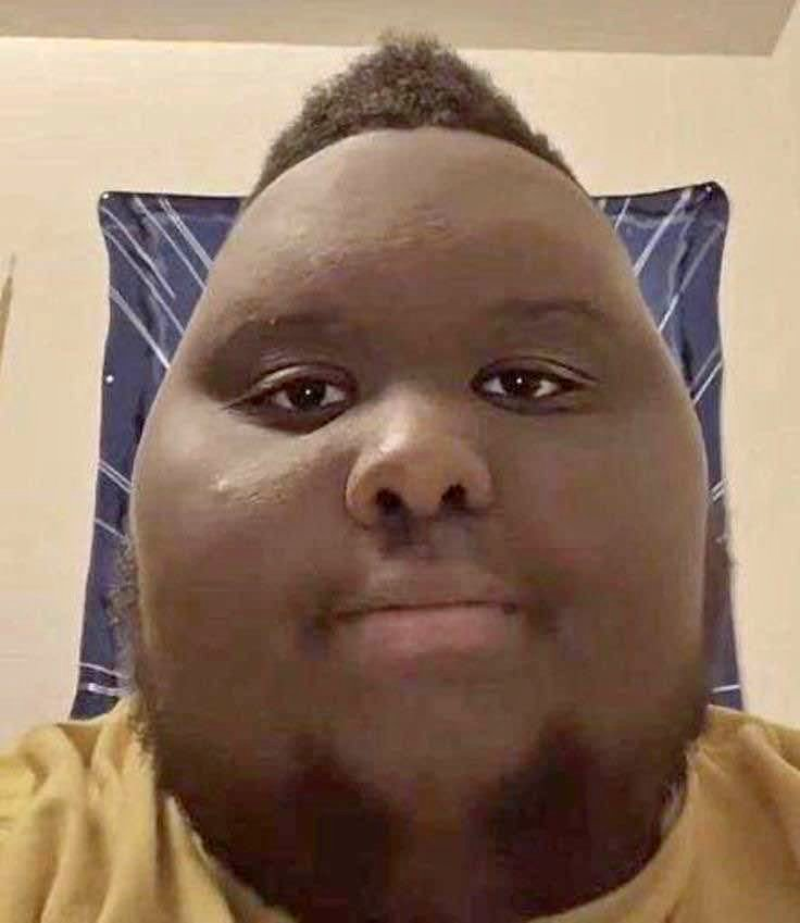 A black guy who looks like an egg.